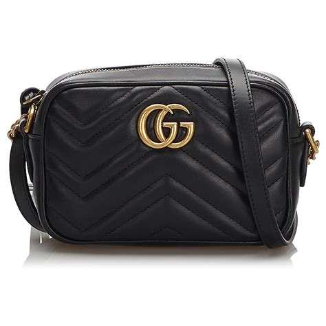 Sacs à bandoulière Gucci pour femme .